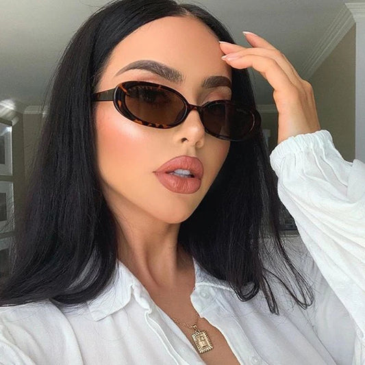 Solar Muse: Retro Oval Leopard Frame Sunglasses