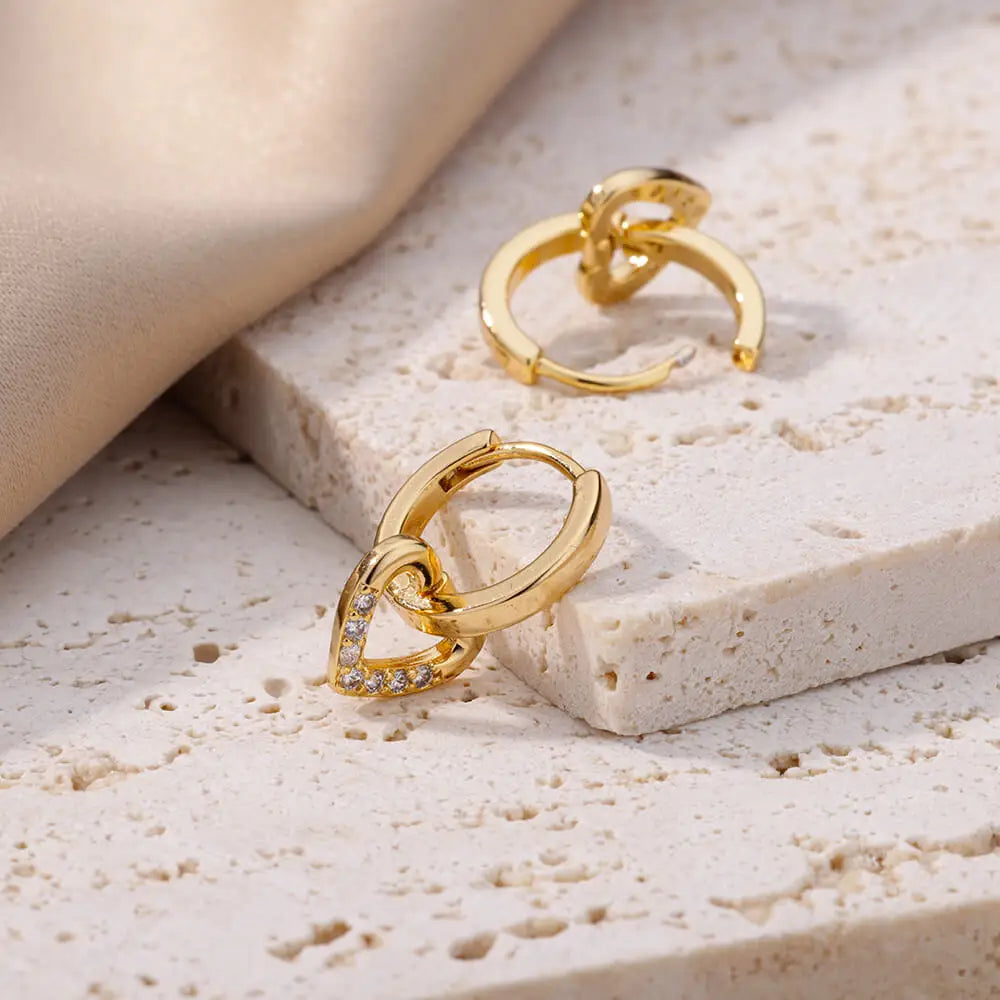 Golden Pulse: Hollow Zircon Heart Stud Earrings