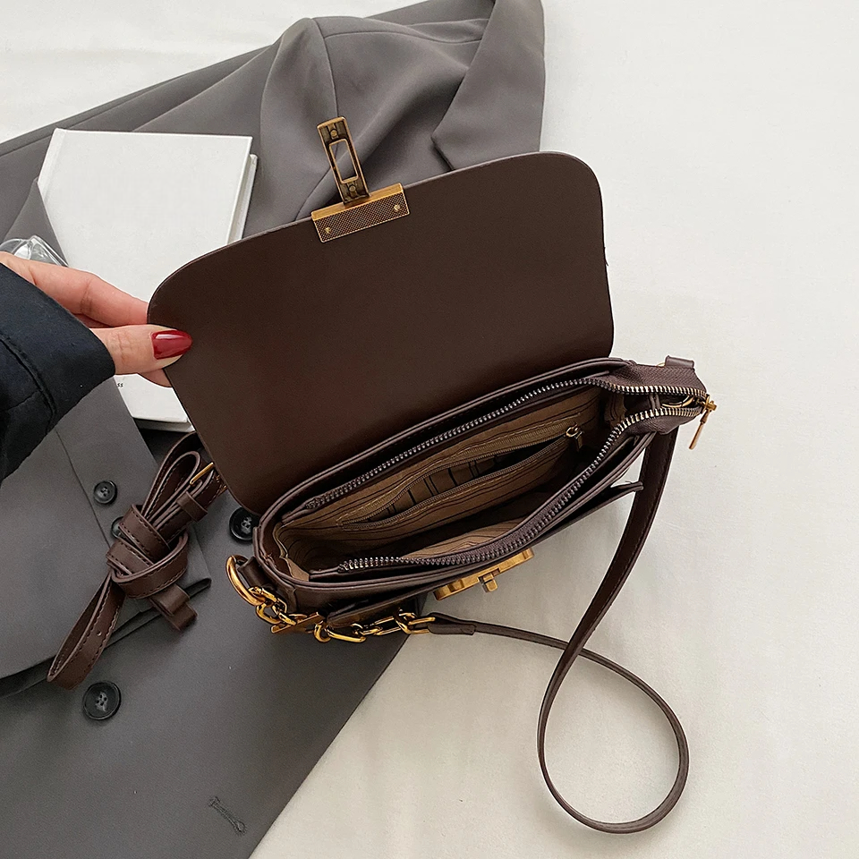 The Lock Flap Bag: Retro Form, Modern Ease