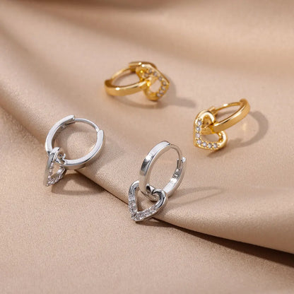 Golden Pulse: Hollow Zircon Heart Stud Earrings