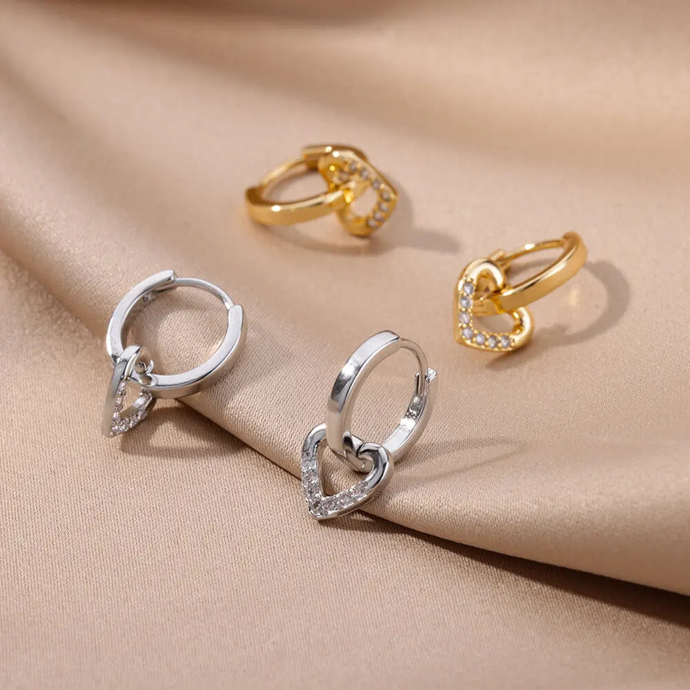 Golden Pulse: Hollow Zircon Heart Stud Earrings