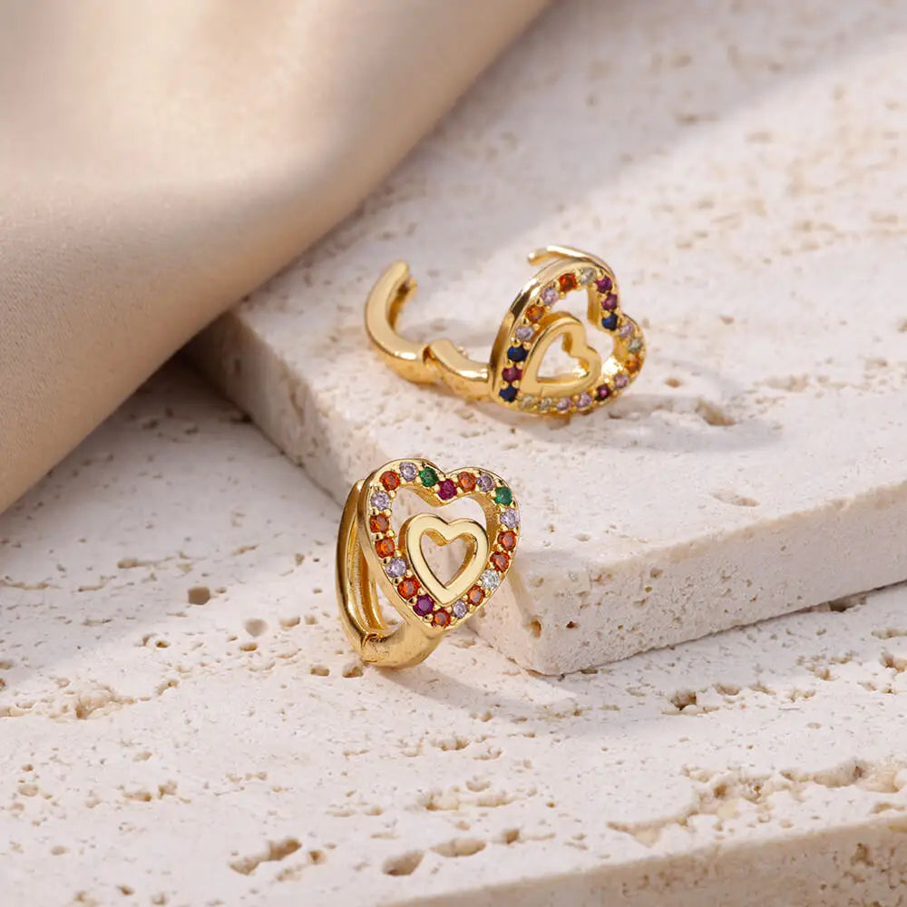 Golden Pulse: Hollow Zircon Heart Stud Earrings