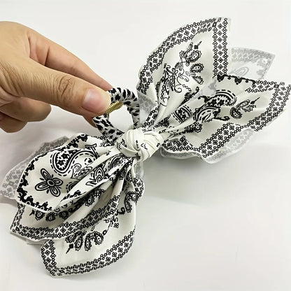 Elegant Retro Double - sided Cashew Flower Love Bow Hair Clip, Suitable for Women, a Good Choice for Birthdays and Festivals.