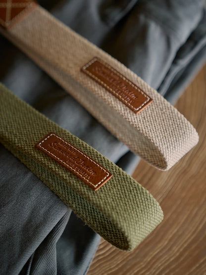 WeaveMark: Braided Canvas Belt with Leather Detail