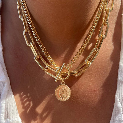 Gilded Rebel: Vintage Punk Coin Pendant Necklace