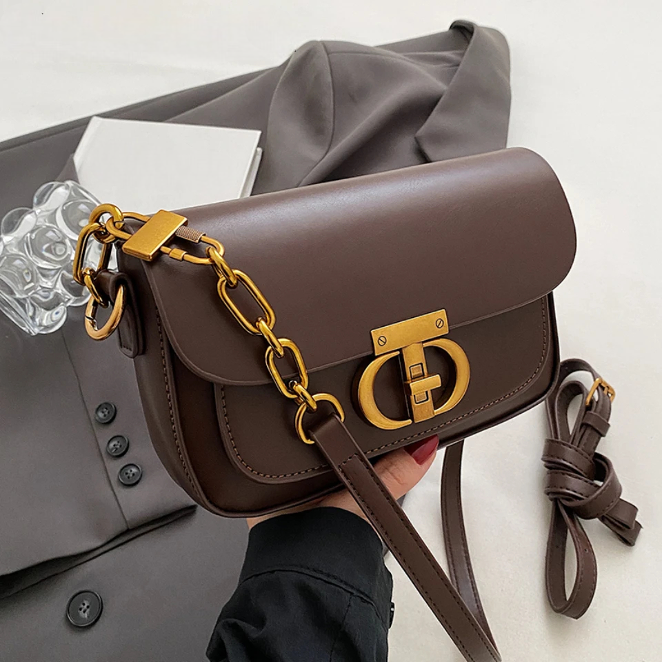 The Lock Flap Bag: Retro Form, Modern Ease